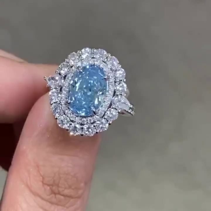 Fancy Blue 5.50tcw Oval Lab Diamond Double Halo Ring | IGI Certified