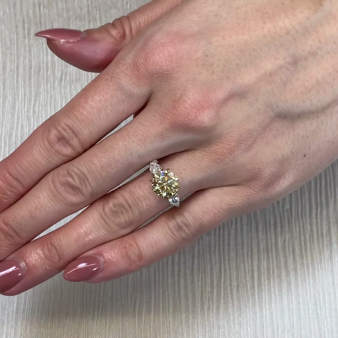 Round Fancy Yellow 3.50tcw Lab Diamond Two-Tone Three Stone Ring | IGI VS Clarity