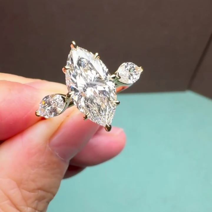 Marquise 3.60tcw Lab Grown Diamond Ring | 3.00ct Center + 0.60ct Marquise Side Stones | IGI Certified | Yellow Gold Three Stone Ring