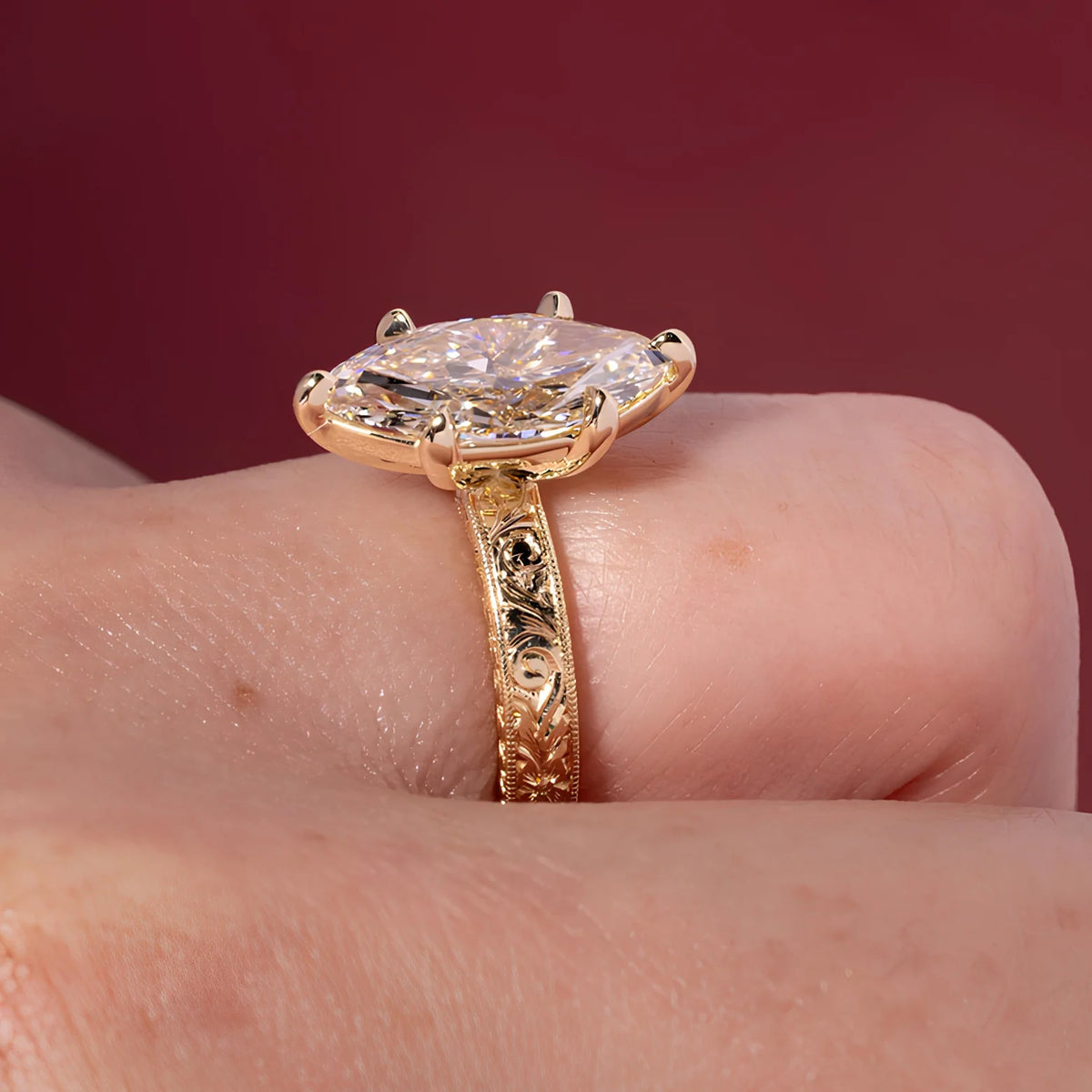 Common :: Close-up of a marquise lab grown diamond engagement ring with an Excellent cut grade.