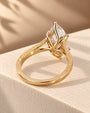 Common :: 3ct Marquise diamond with six-point prong setting and ornate band
