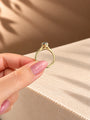 Common :: Teal Marquise diamond solitaire ring with refined 2mm band