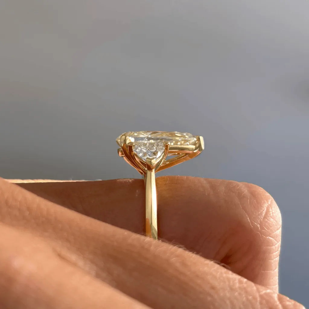 Common :: elegant yellow pear trilogy ring lab grown diamond luxury proposal ring