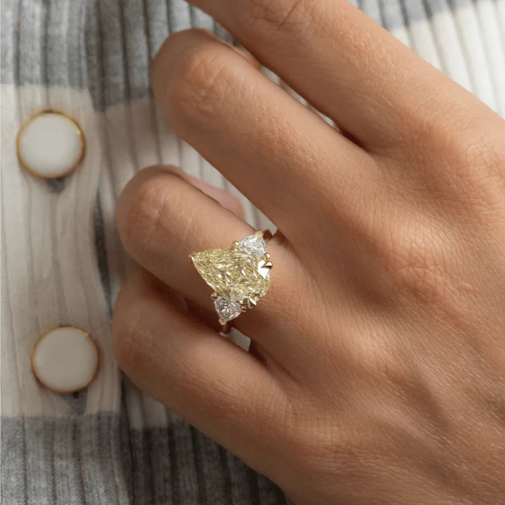 Common :: luxury 5.17ct pear yellow diamond engagement ring lab grown three stone design